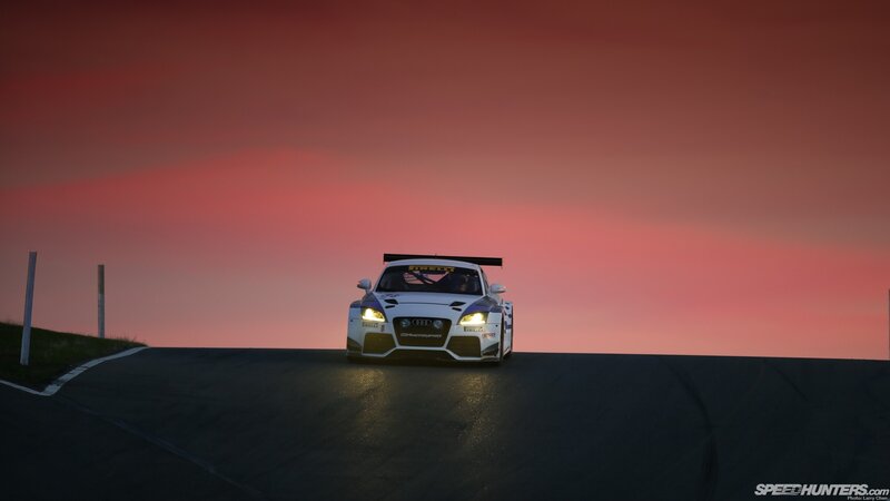 White Race Car on Track — Red, Dramatic