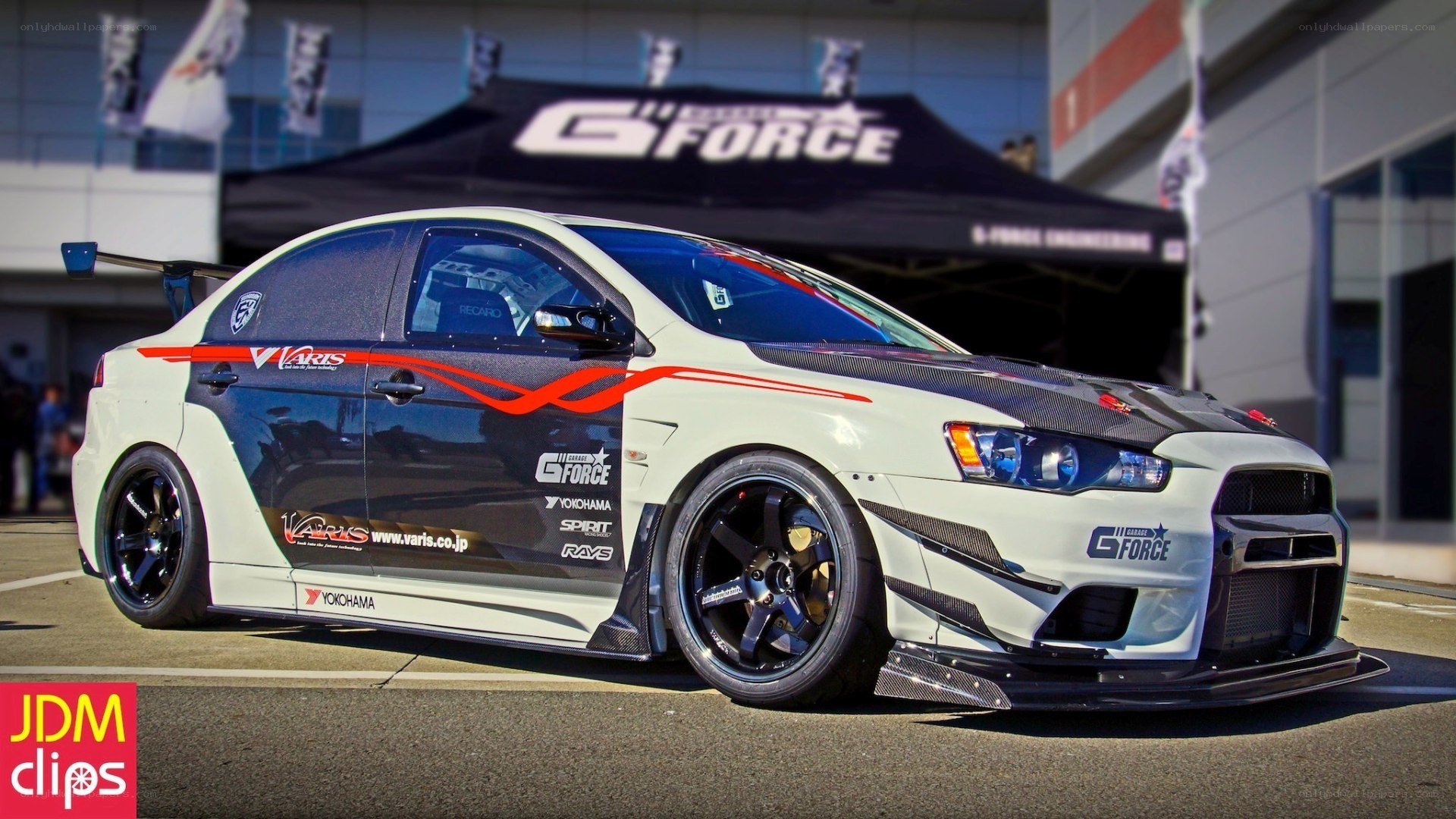 white race car with decals