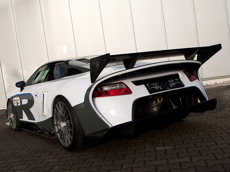 white race car with large rear wing