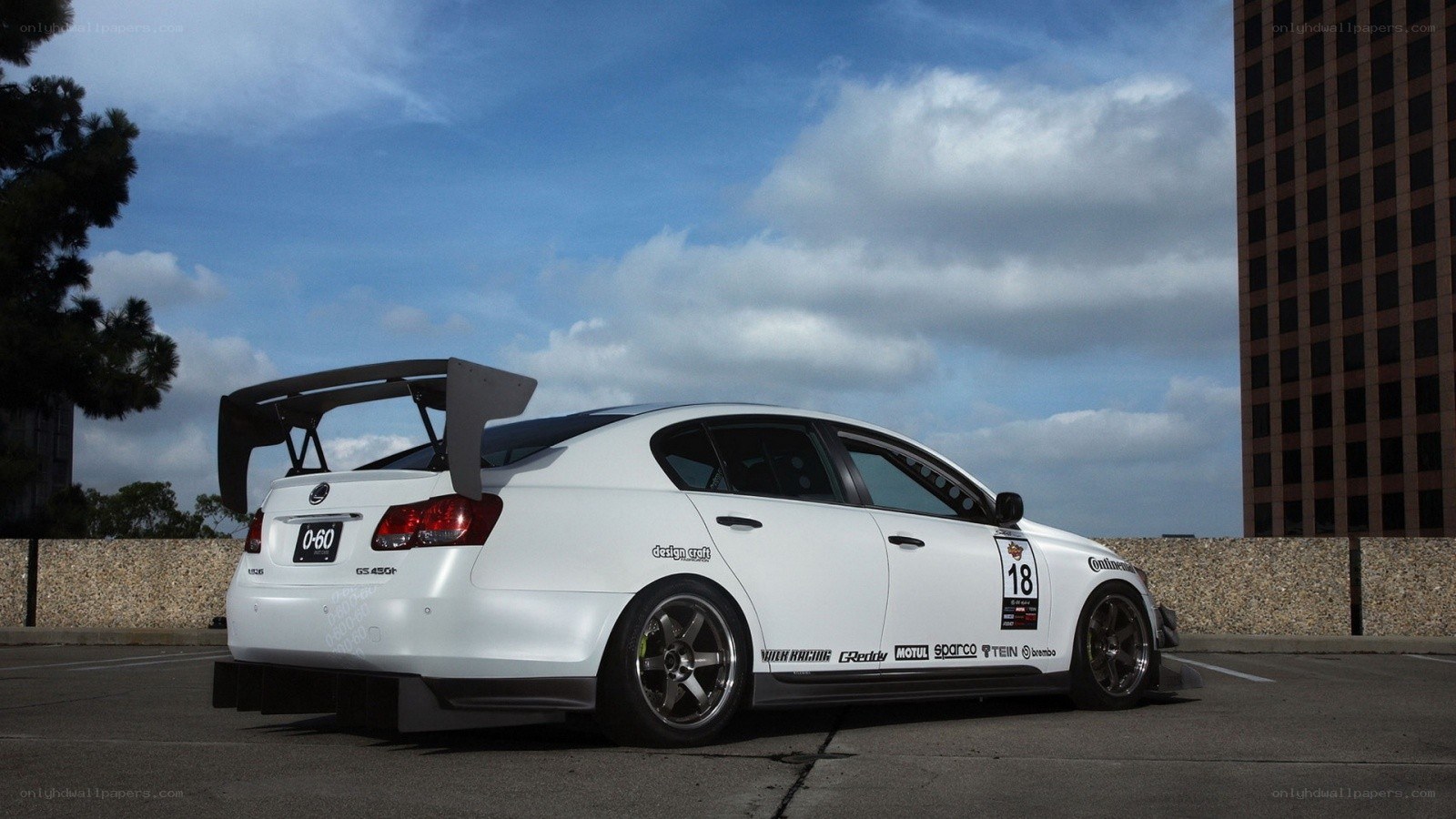 white race car with large wing