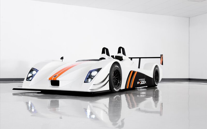 white race car with orange stripes