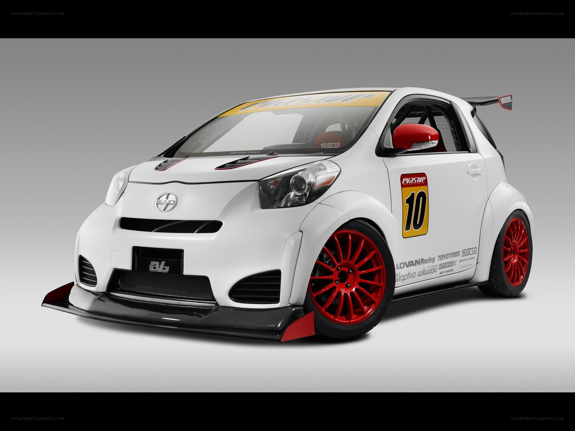 white race car with red wheels