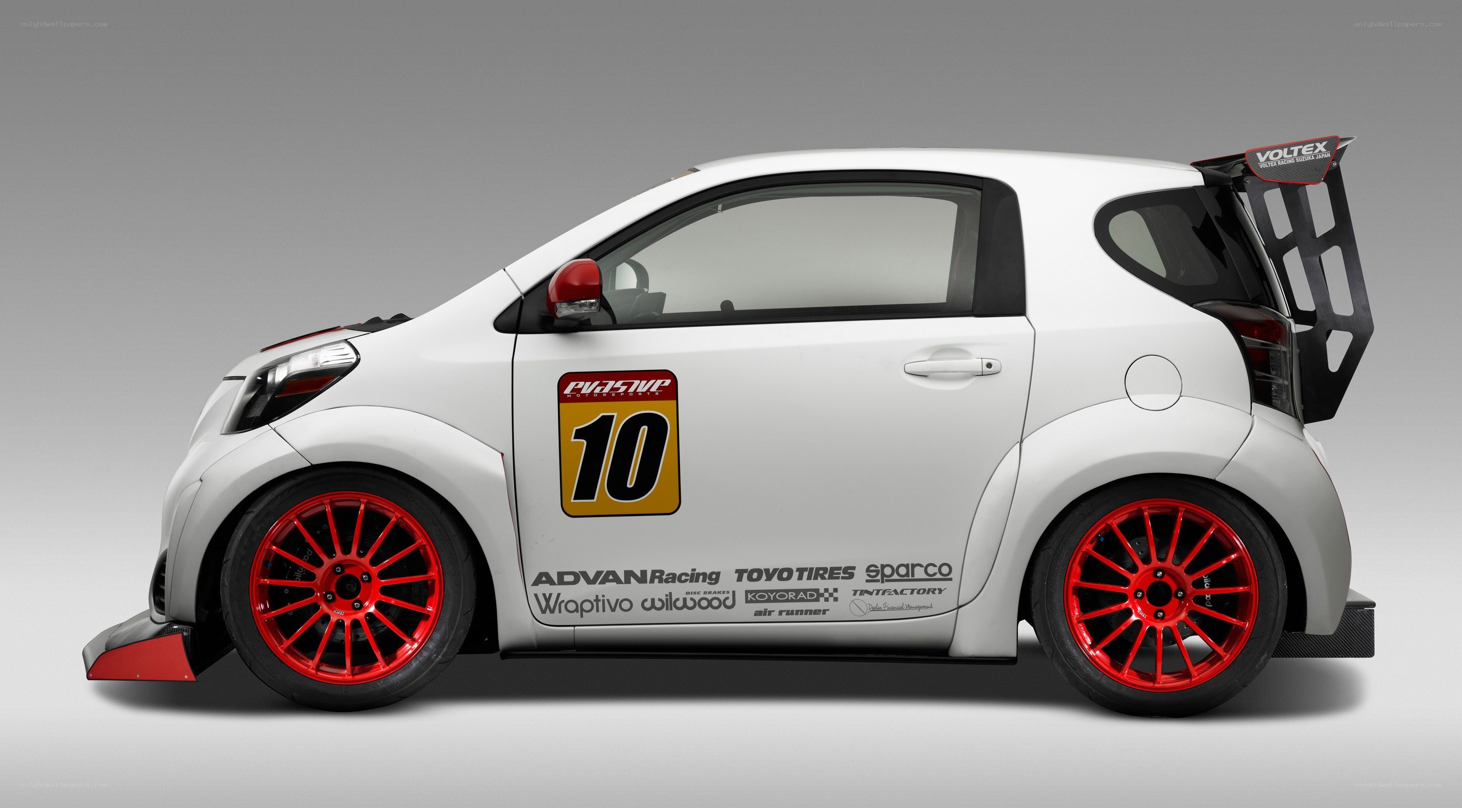 white race car with red wheels