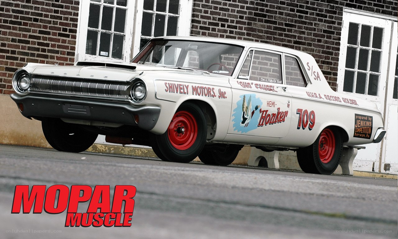 white race car with red wheels