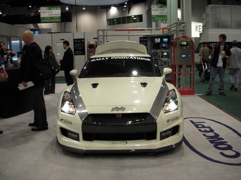 White rally car at auto show