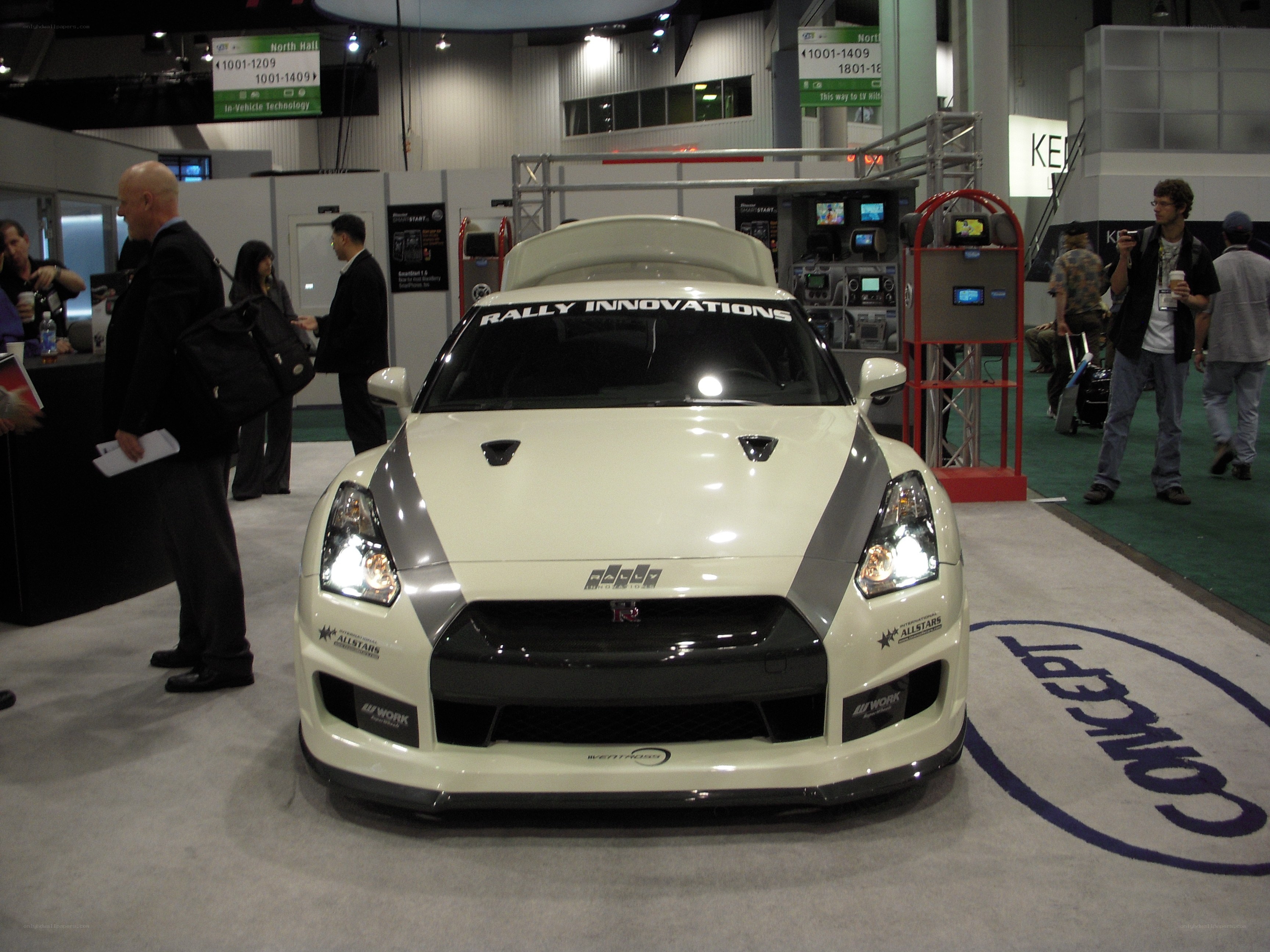 White rally car at auto show