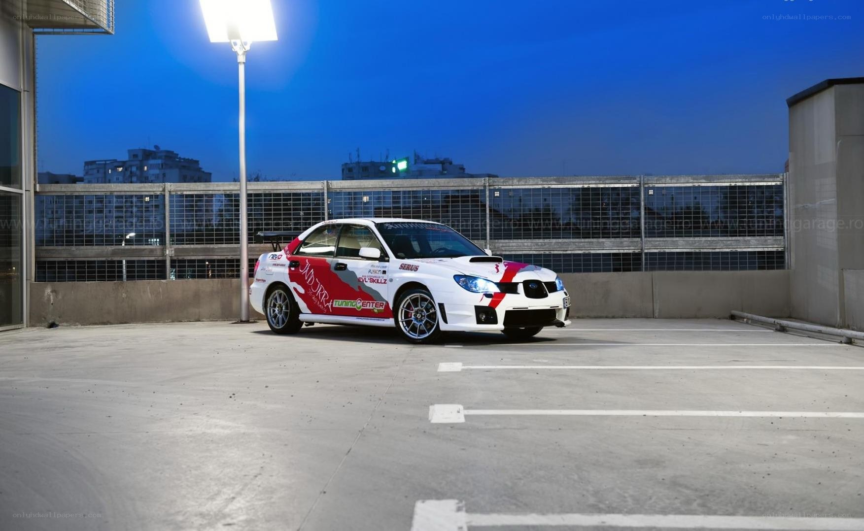white rally car at dusk