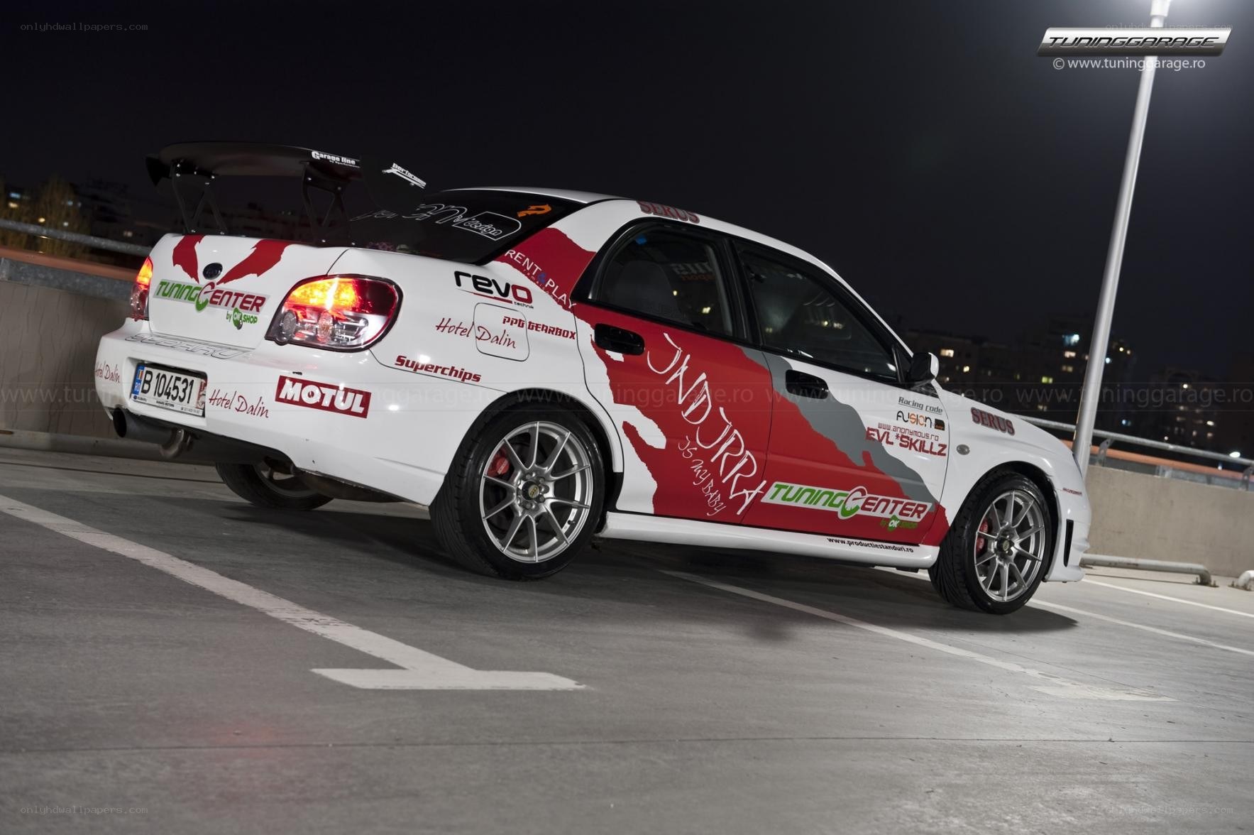 white rally car at night
