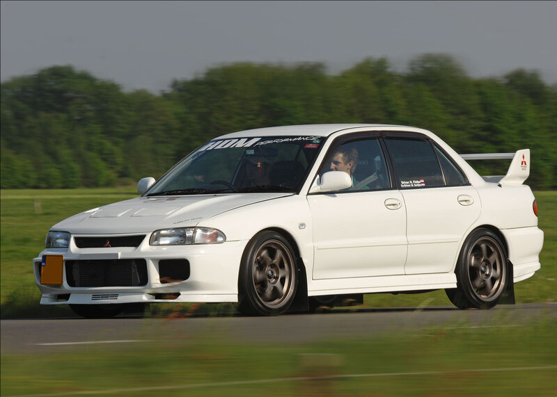 white rally car in motion