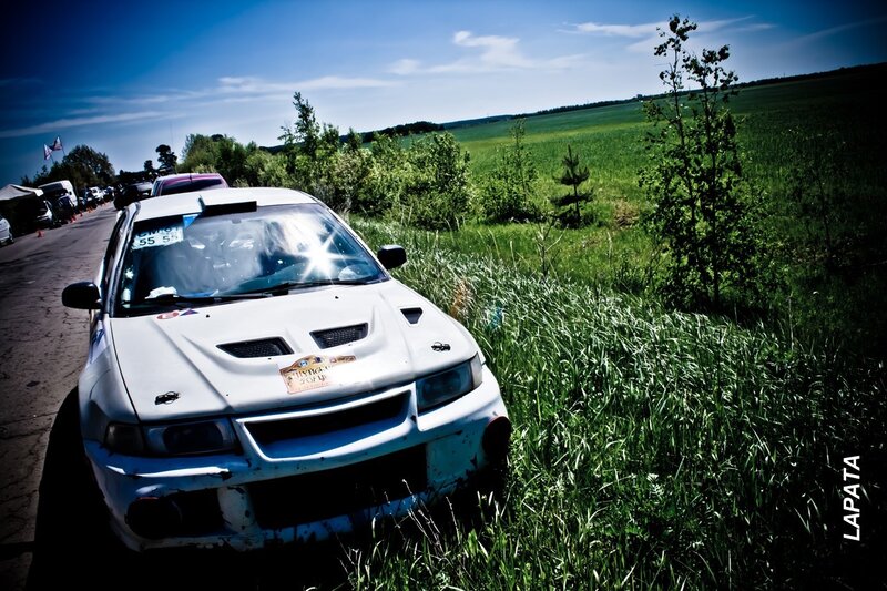 White rally car on grass