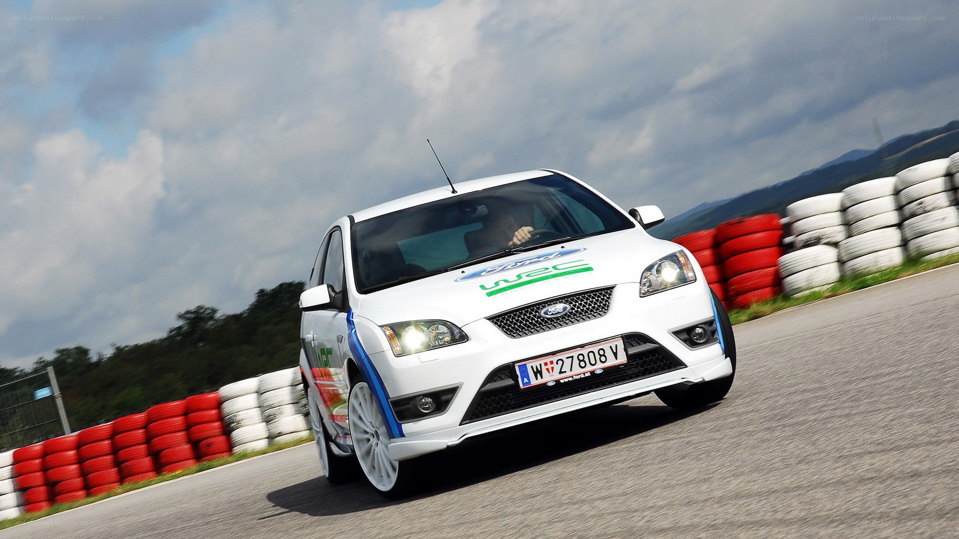 white rally car on track