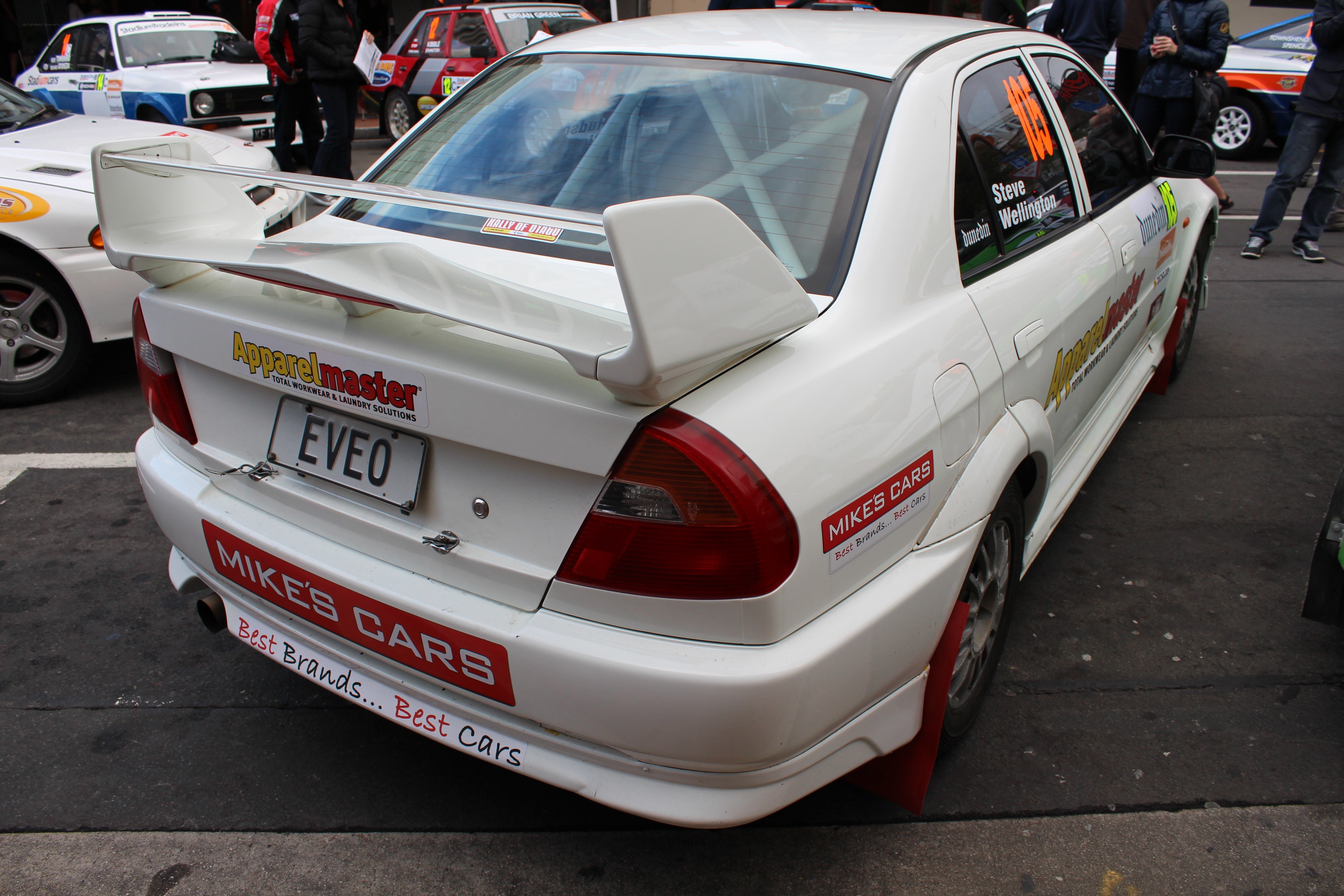 white rally car with decals
