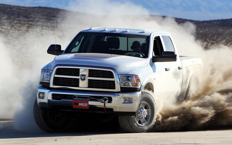 White Ram truck kicking up dust