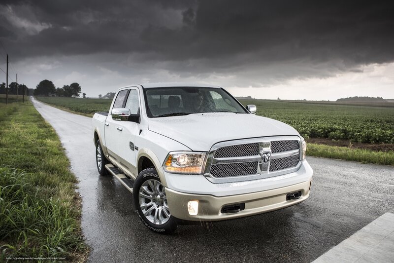 White Ram truck on wet road