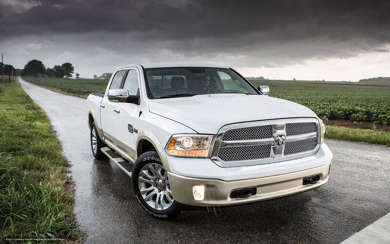 White Ram truck on wet road