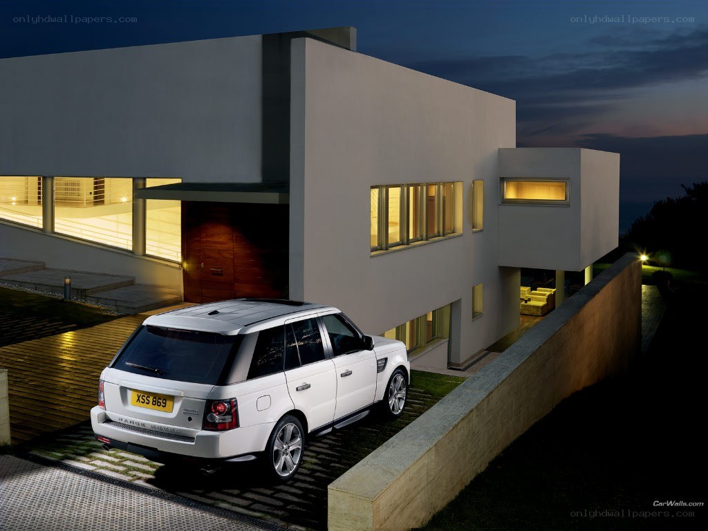 White Range Rover at modern house