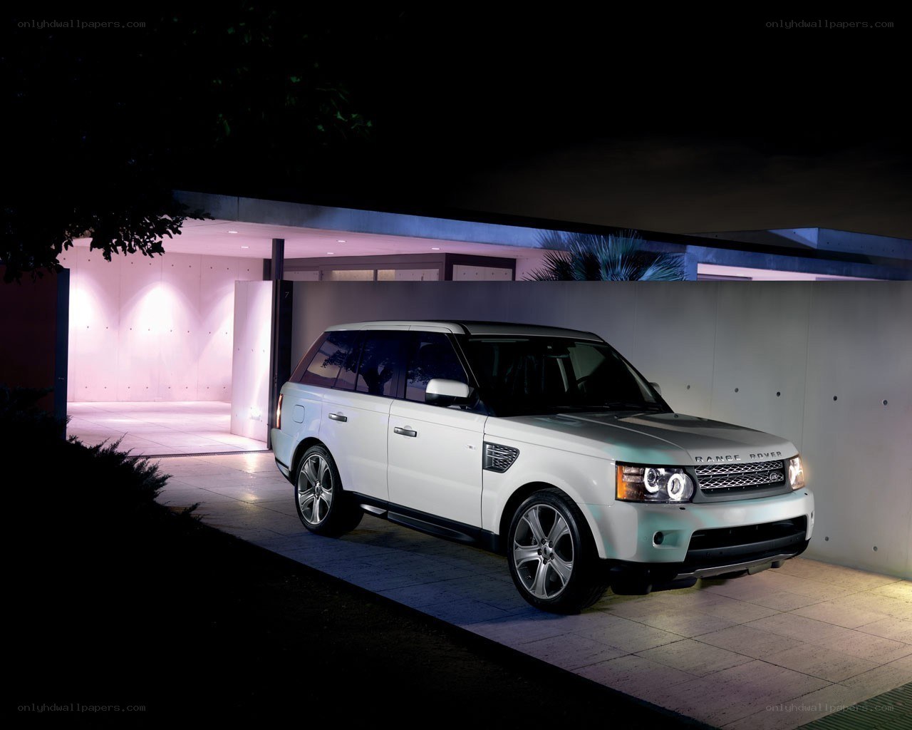 White Range Rover at night