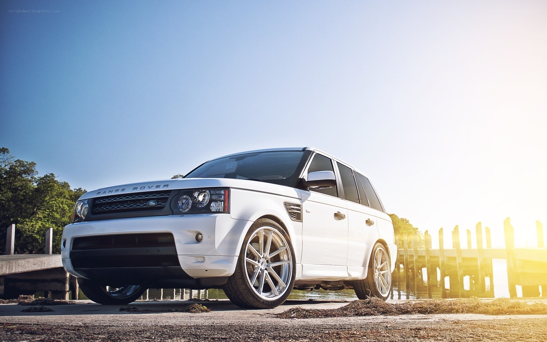 White Range Rover by the water