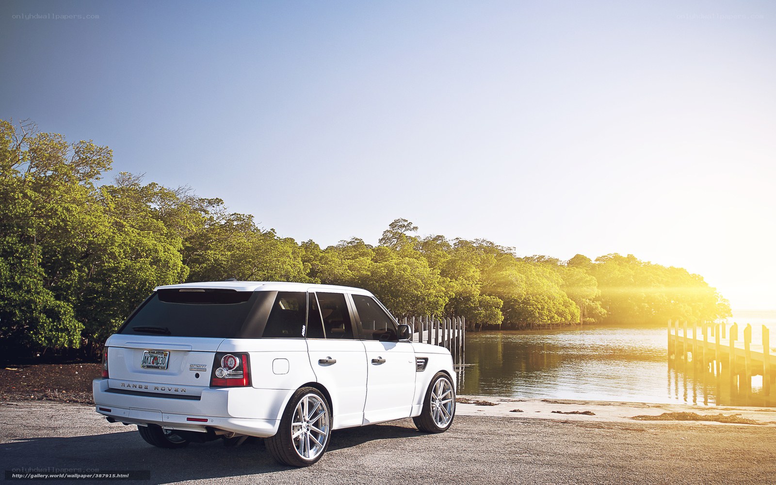 White Range Rover by the water