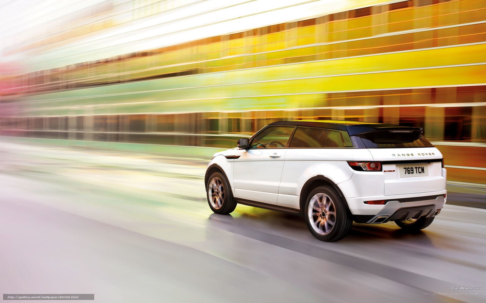 White Range Rover Evoque in motion