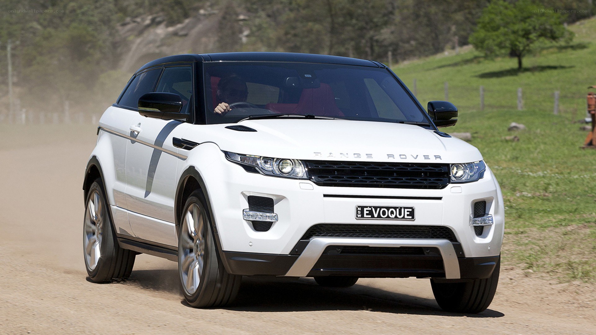 White Range Rover Evoque on dirt road