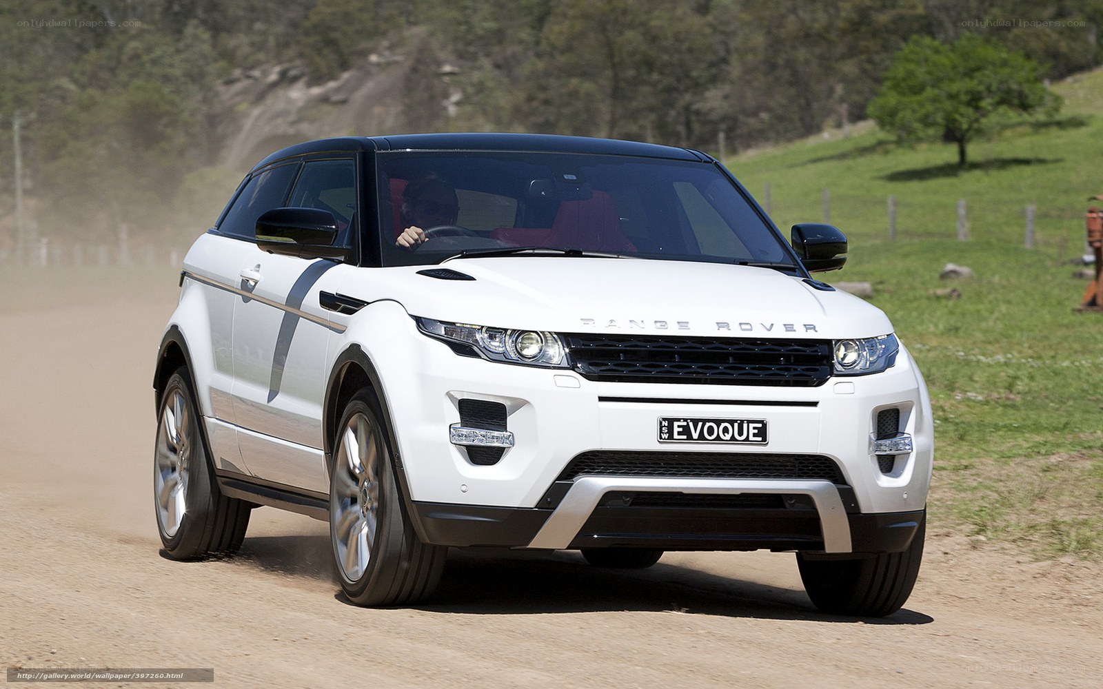 White Range Rover Evoque on dirt road