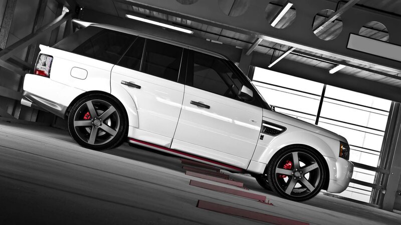 white range rover in garage