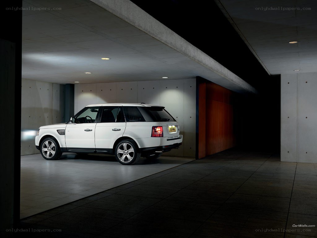 White Range Rover in garage
