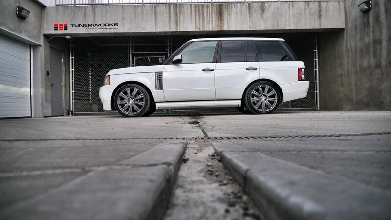 White Range Rover in garage