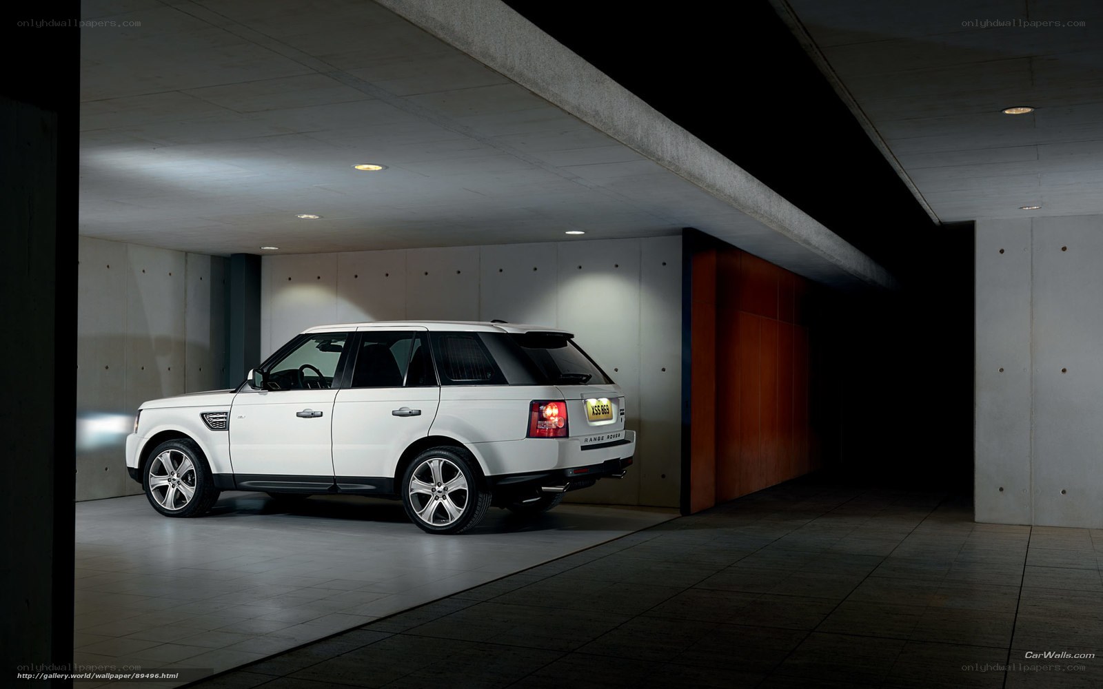 White Range Rover in garage