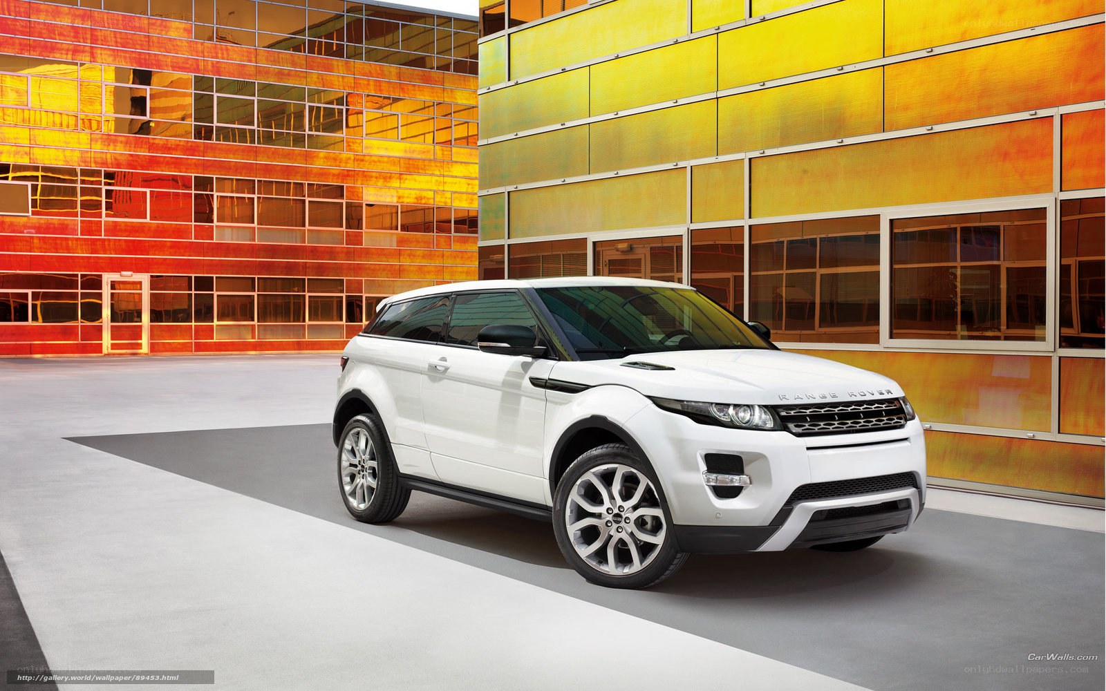 White Range Rover in modern city