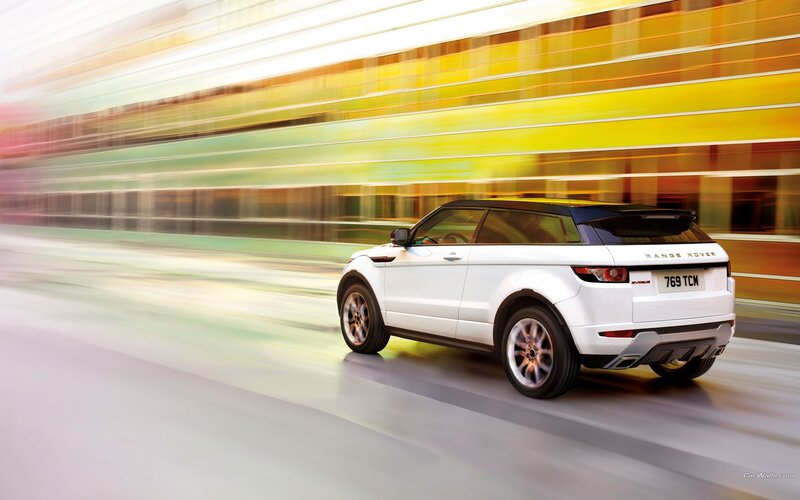 White Range Rover in motion