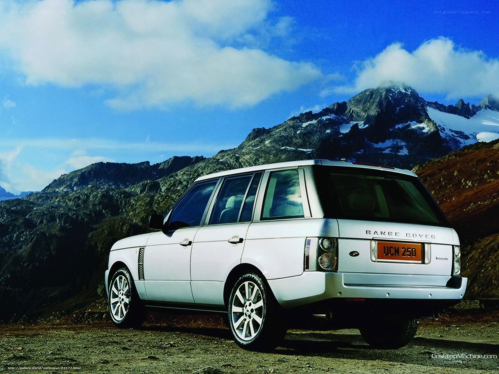 White Range Rover in mountains