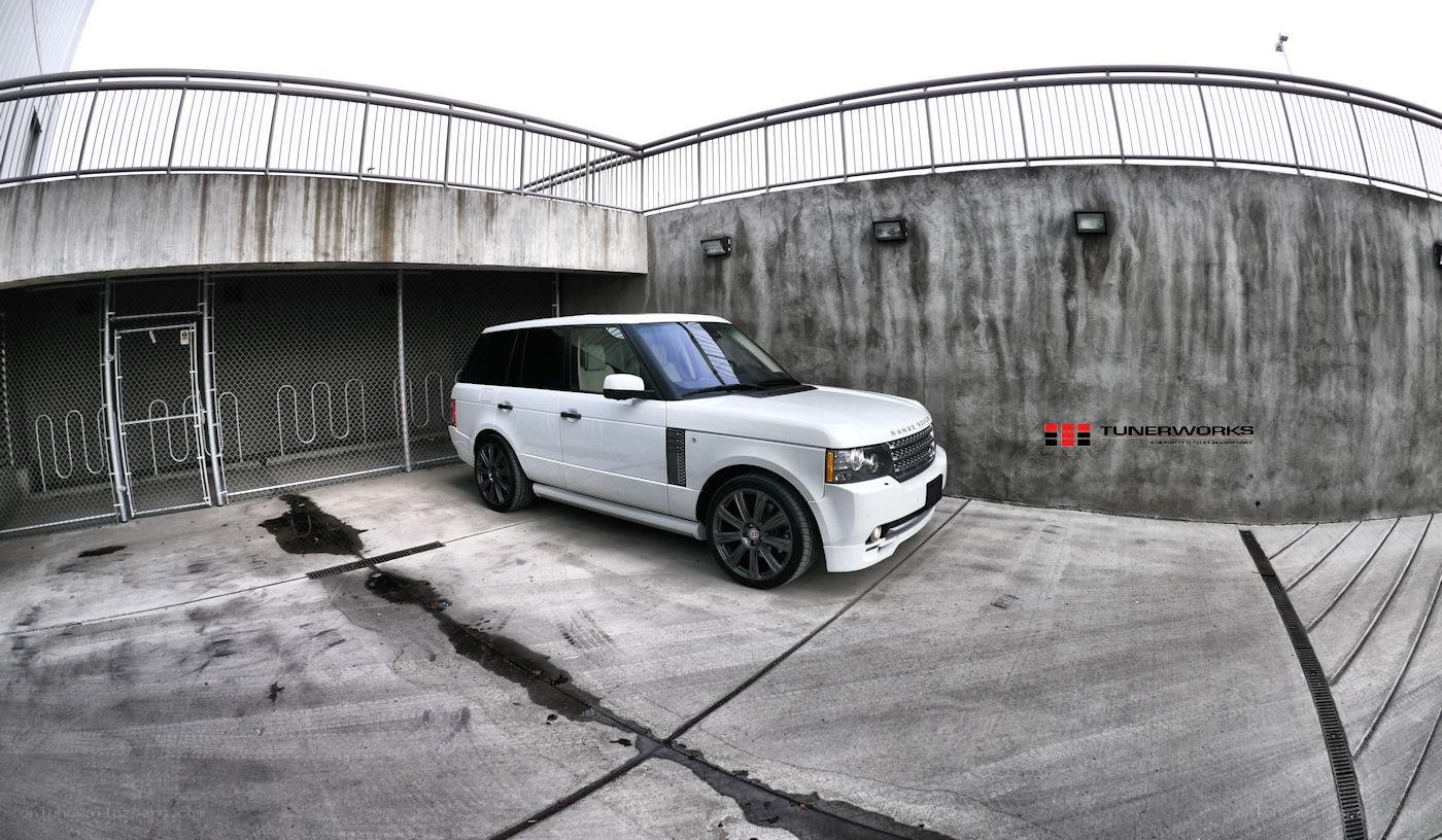 White Range Rover in parking garage