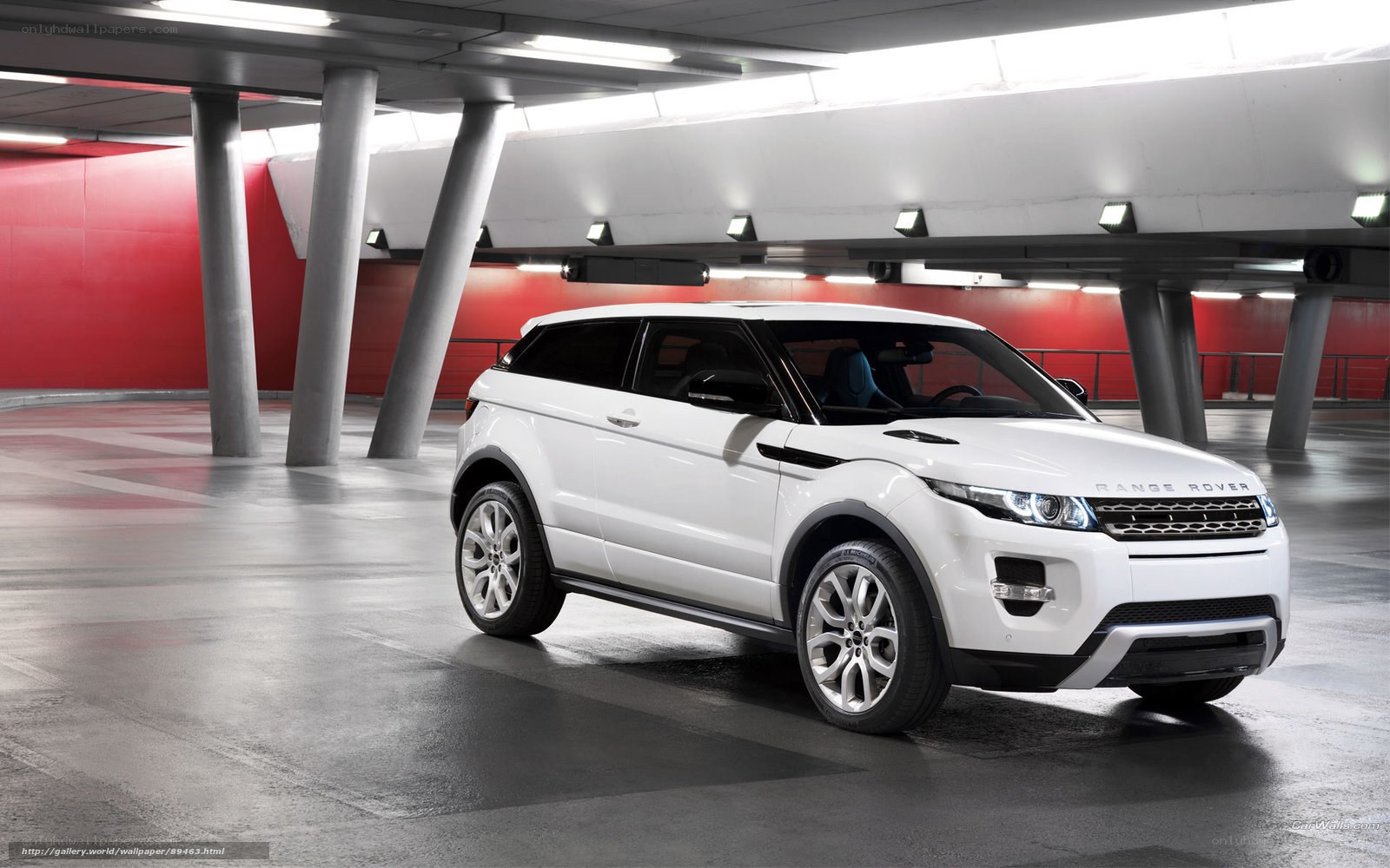 White Range Rover in parking garage