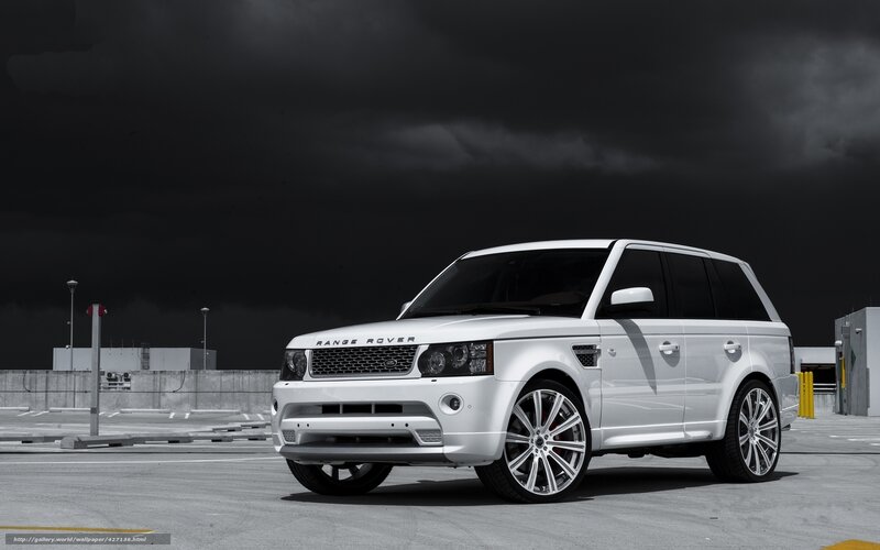 White Range Rover in parking lot