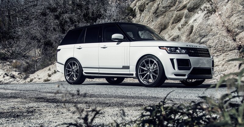 White Range Rover on a mountain road