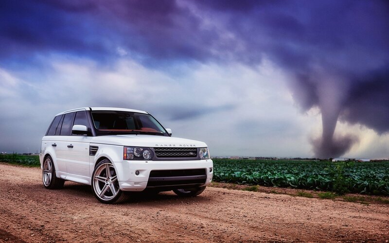 White Range Rover on dirt road
