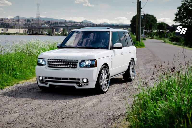 White Range Rover on gravel road