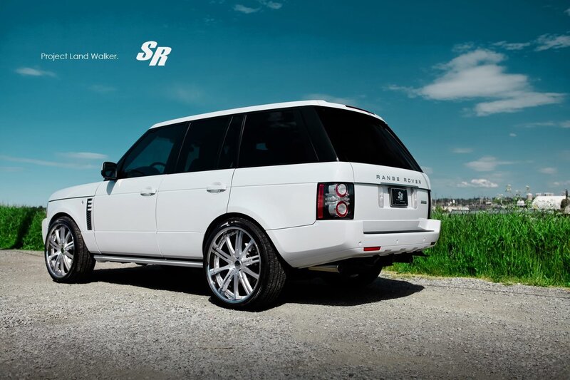 White Range Rover on gravel