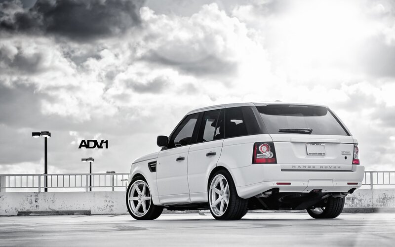 White Range Rover on rooftop