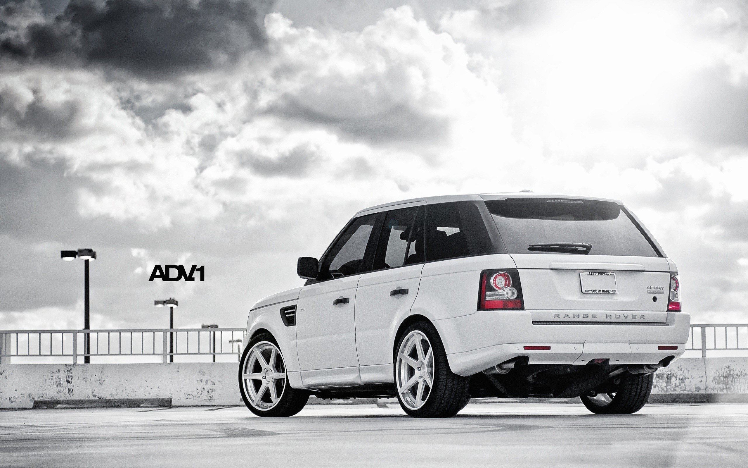 White Range Rover on rooftop