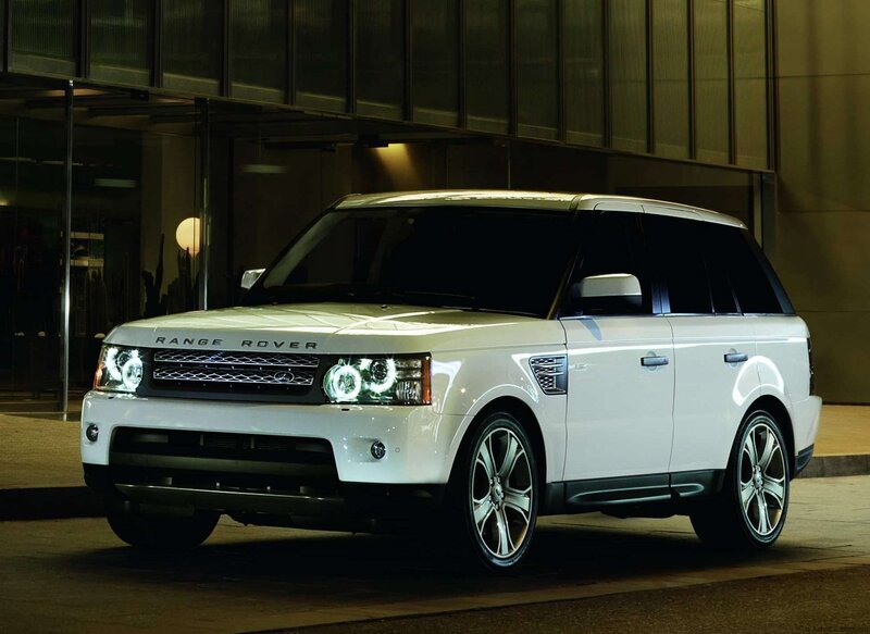 White Range Rover parked at night