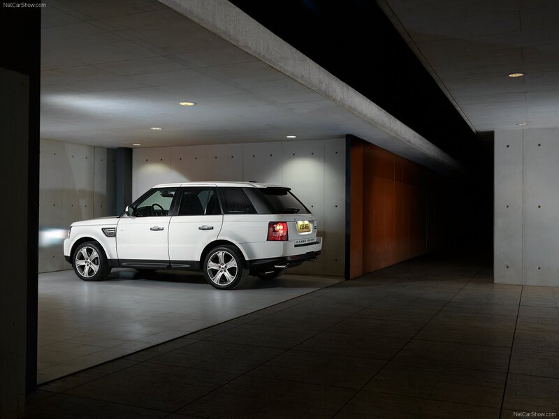 White Range Rover parked in garage