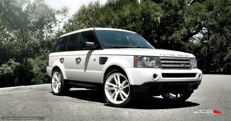 White Range Rover parked outdoors