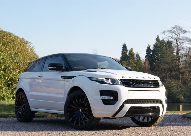 White Range Rover Suv — Serene, Afternoon, Photograph, Trees