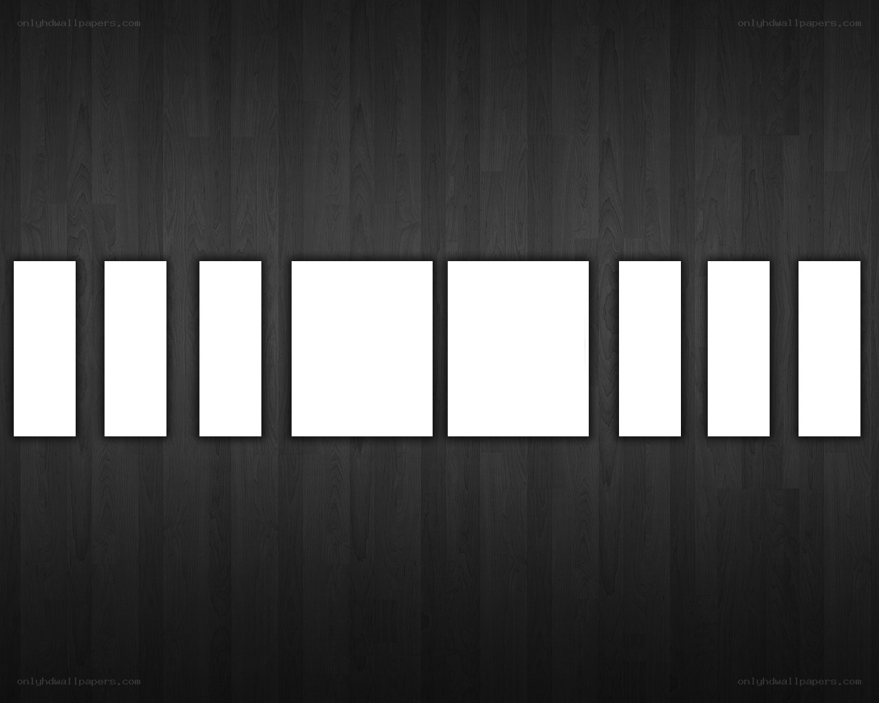 white rectangles on dark wood