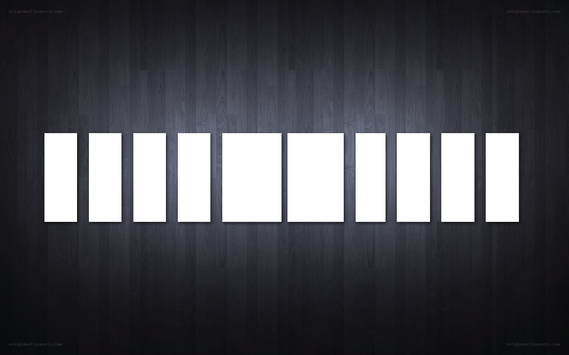 white rectangles on dark wood