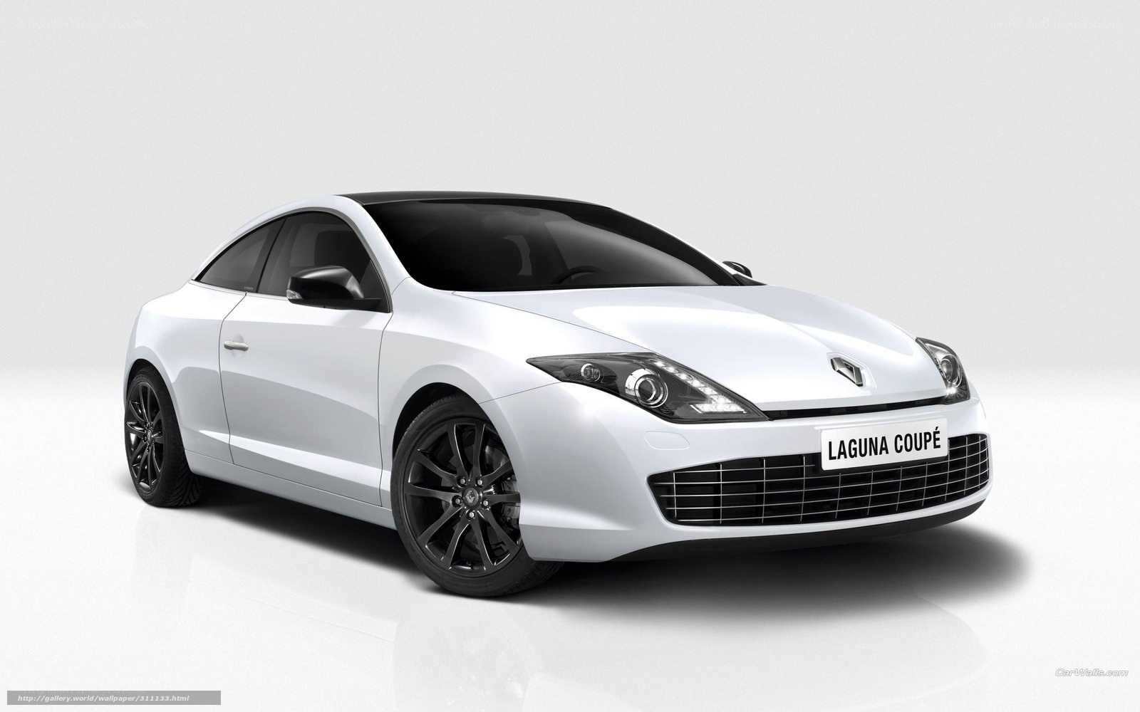 White Renault Laguna Coupe