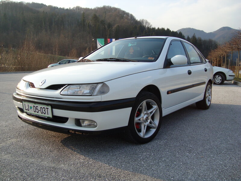 White Renault Laguna parked outdoors